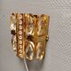 Swedish wall lamp in gold-colored metal with glass prisms. Estimated 1970-80s.