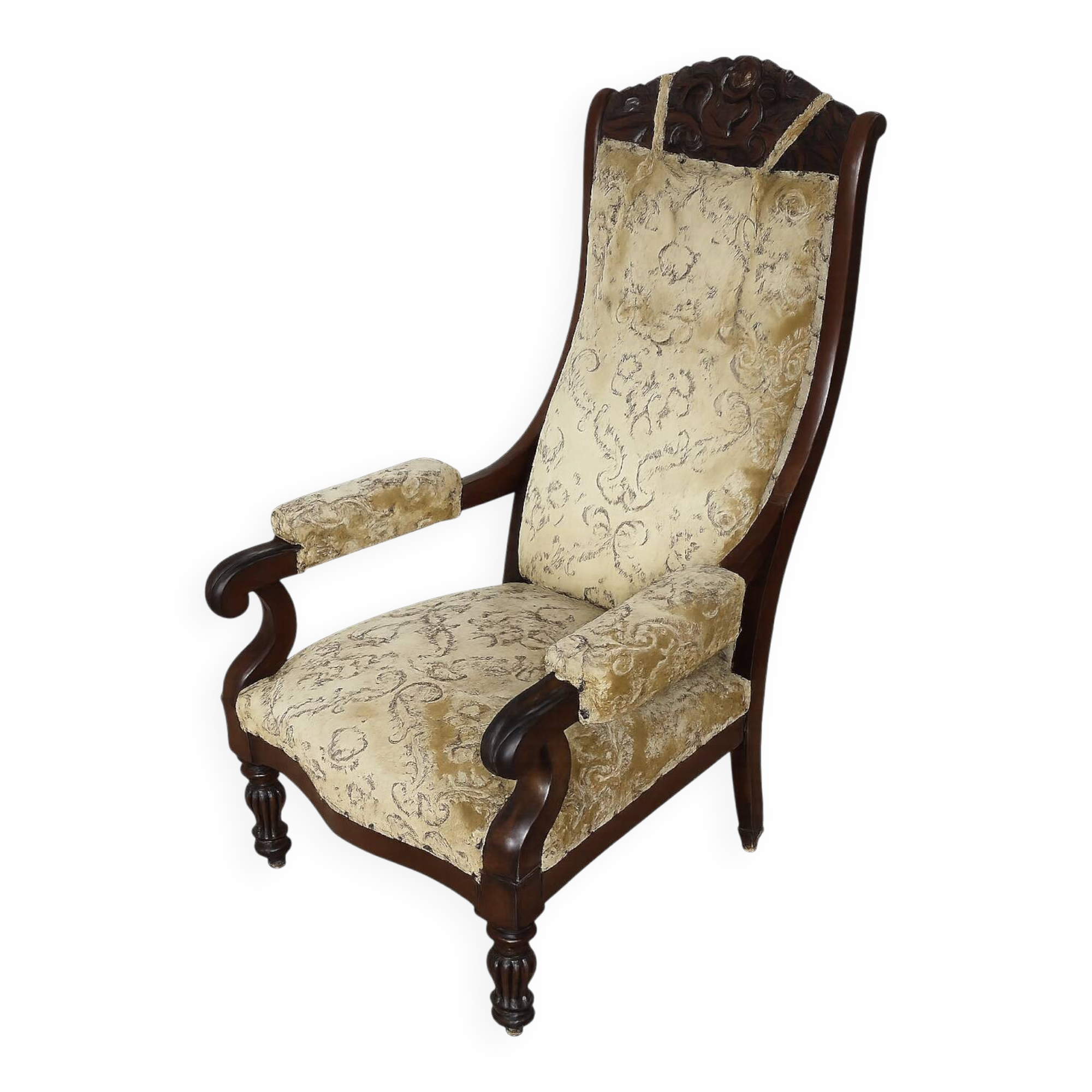 An antique armchair from the turn of the 19th and 20th centuries, carved wa