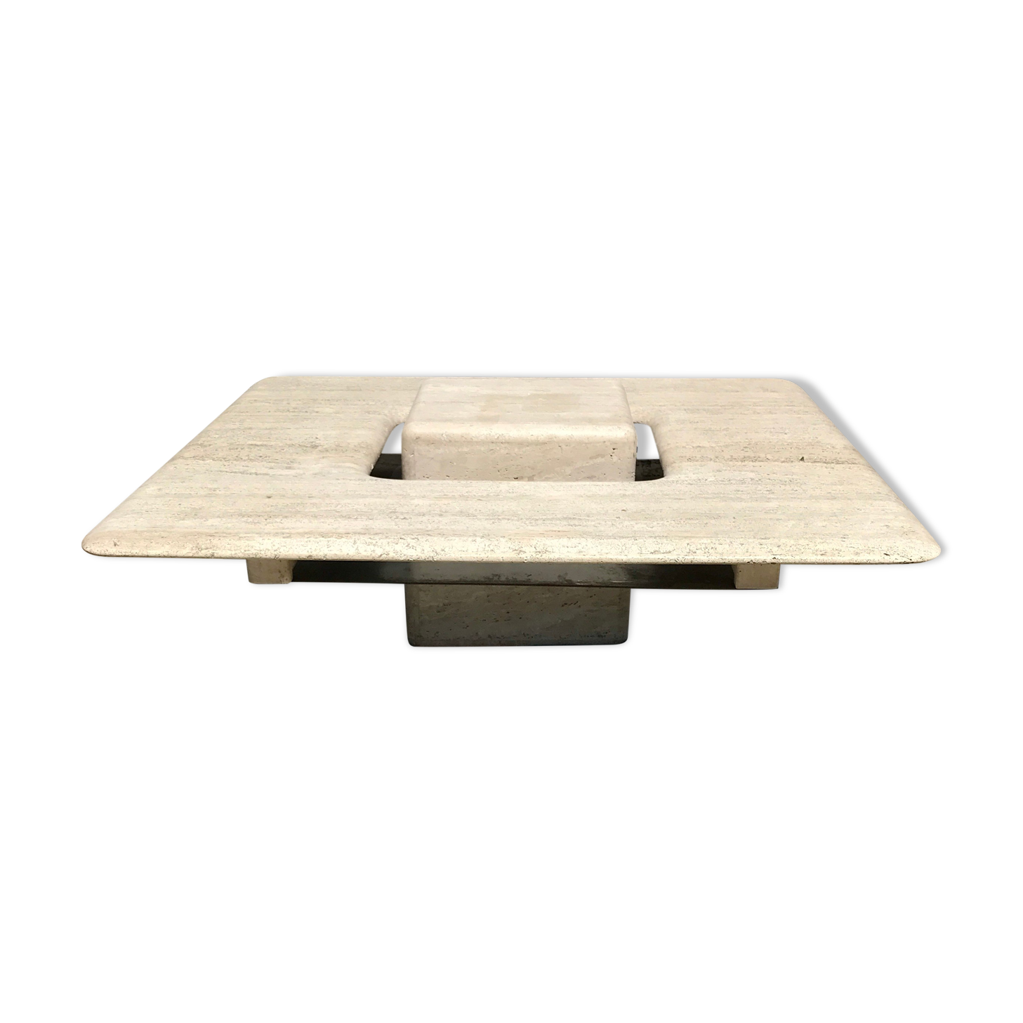 Sculptural travertine coffee table