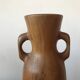 Olive wood flower vase.