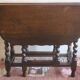 Antique farmhouse patinated extendable table in oak with carved edge, 1900