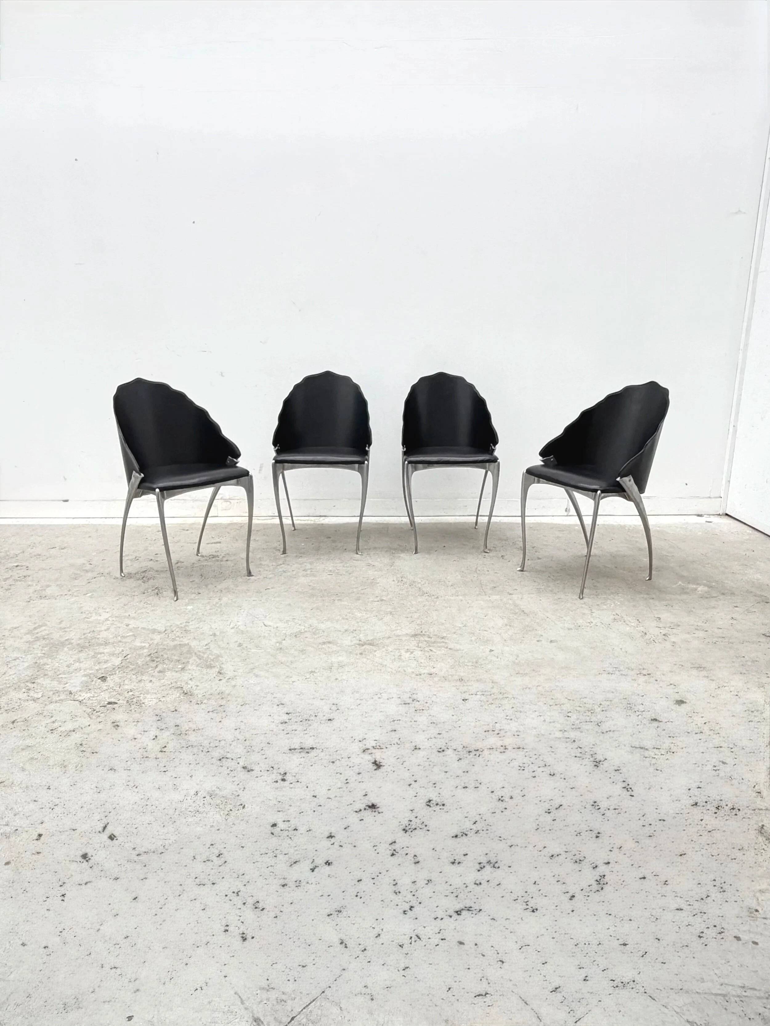 Set of 4 chairs by Bernard Dequet for Protis France Design in cast aluminum and leather, France 1980
