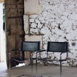 Cantilever armchair in chromed metal and black leather, 1970