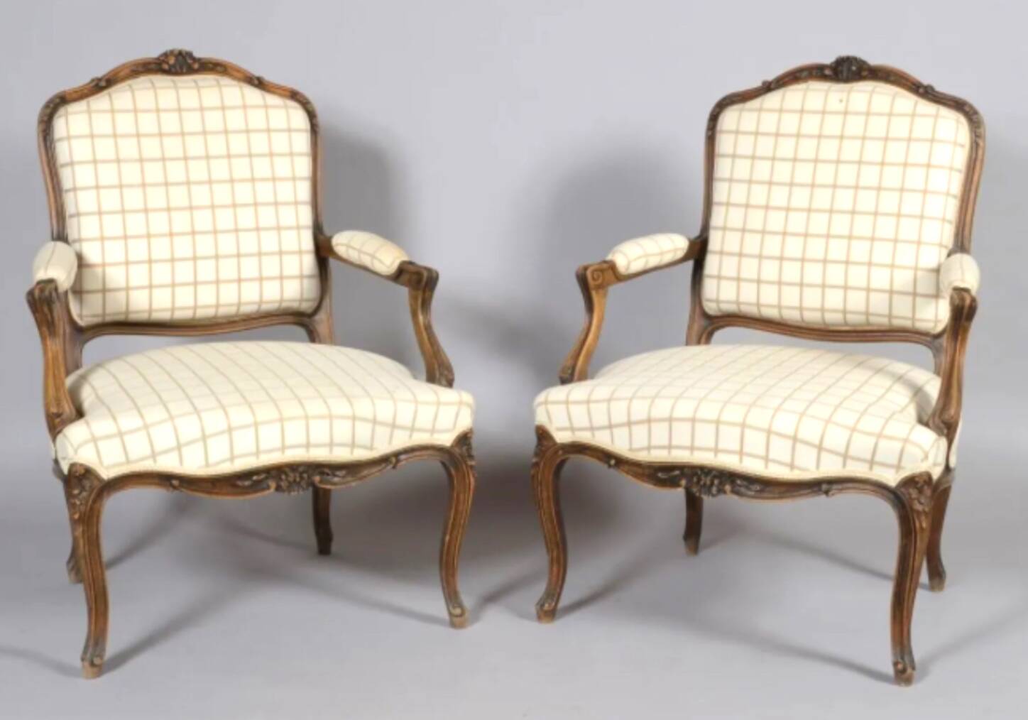 Pair of Louis XV style armchairs in molded and carved beech