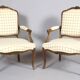 Pair of Louis XV style armchairs in molded and carved beech