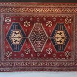 Wall rug with oriental patterns.