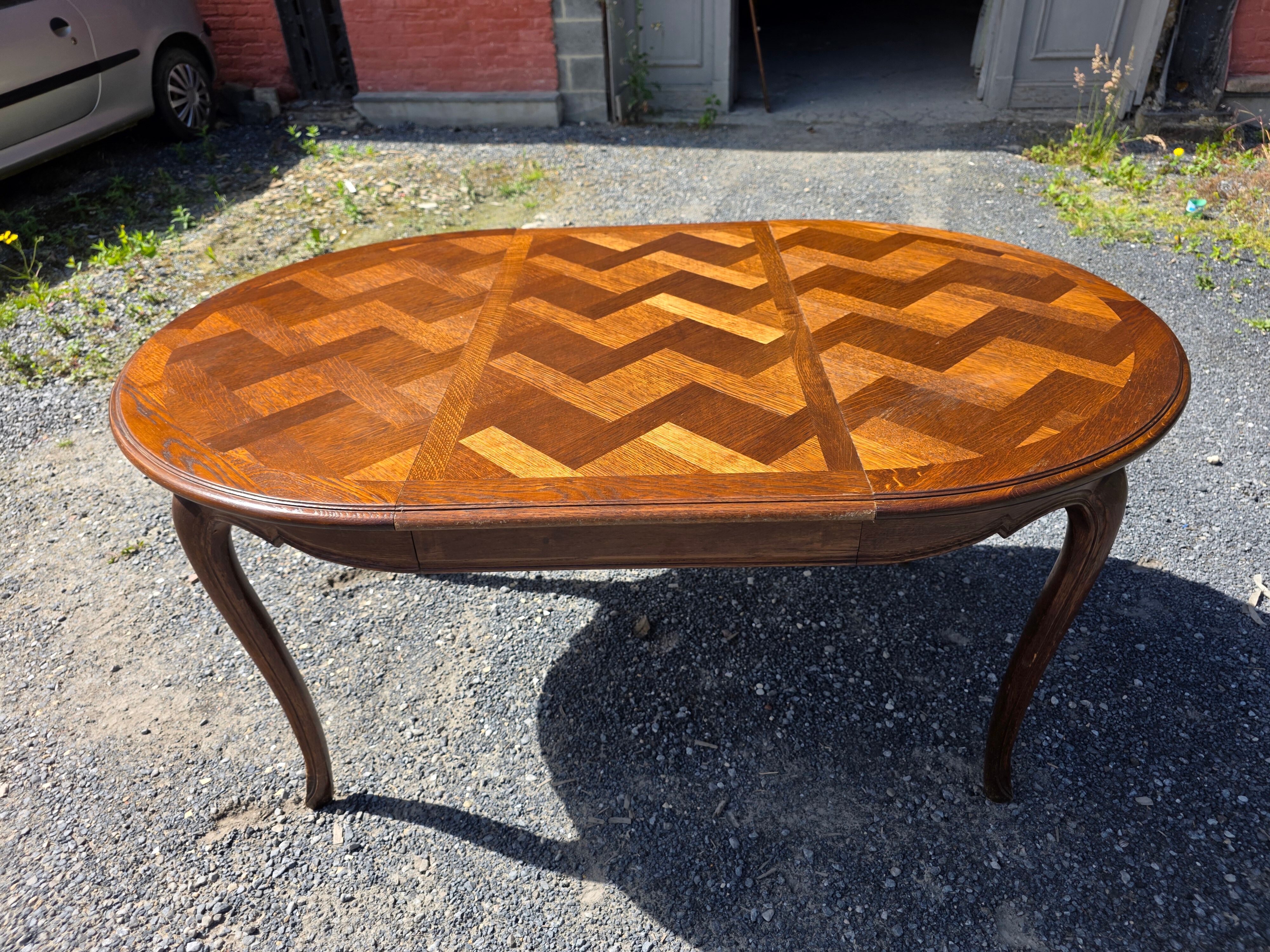 Extendable table in Louis XV style in oak (2 extensions)