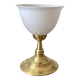 Antique white opaline glass globe table lamp with a brass base.
