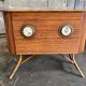 Rattan and wood bar with its decorative brass portholes