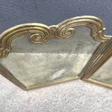 Antique brass fireplace screen from 1920, vintage spark guard.