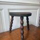 Three-legged turned wooden stool