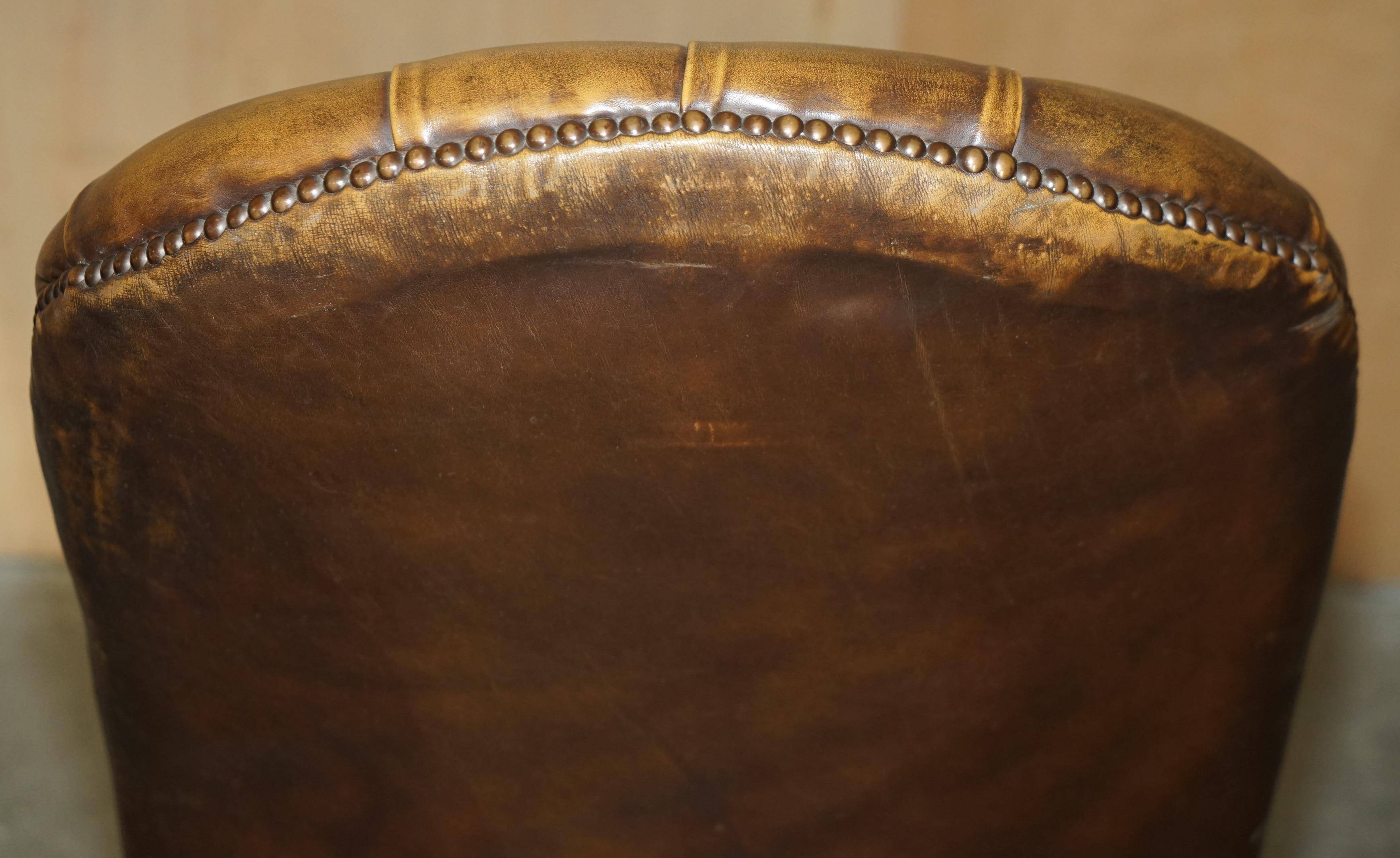 Fauteuil Chesterfield vintage en cuir vieilli