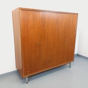 Vintage Scandinavian modernist wardrobe in teak and metal from the 1960s.
