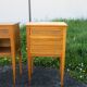 Pair of walnut bedside tables in Louis XVI style with brass inlay.