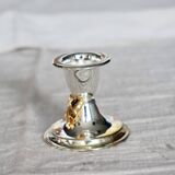 Small vintage silver-plated metal candlestick with a gold bow