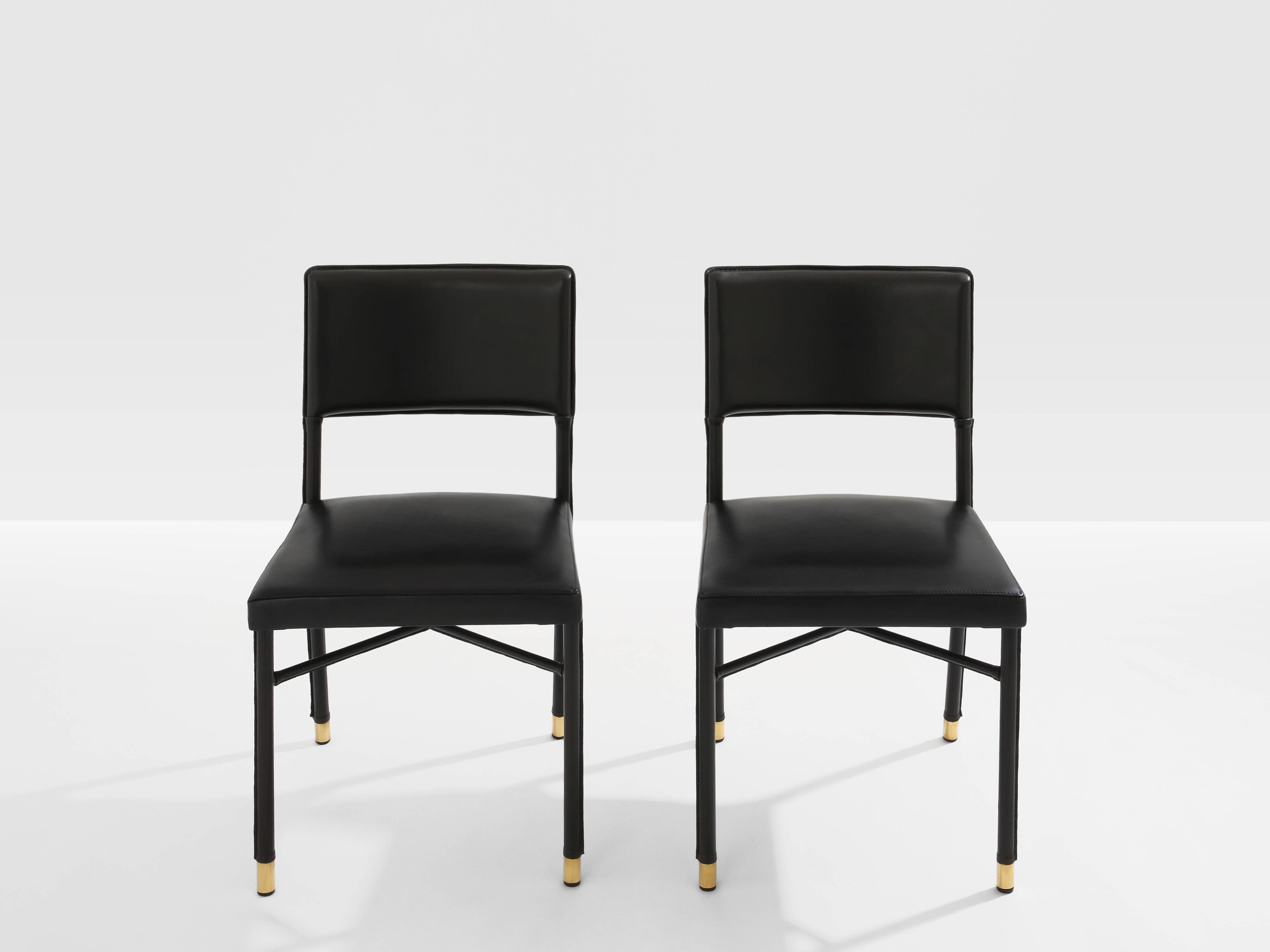 Jacques Quinet paire de chaises cuir noir laiton 1950