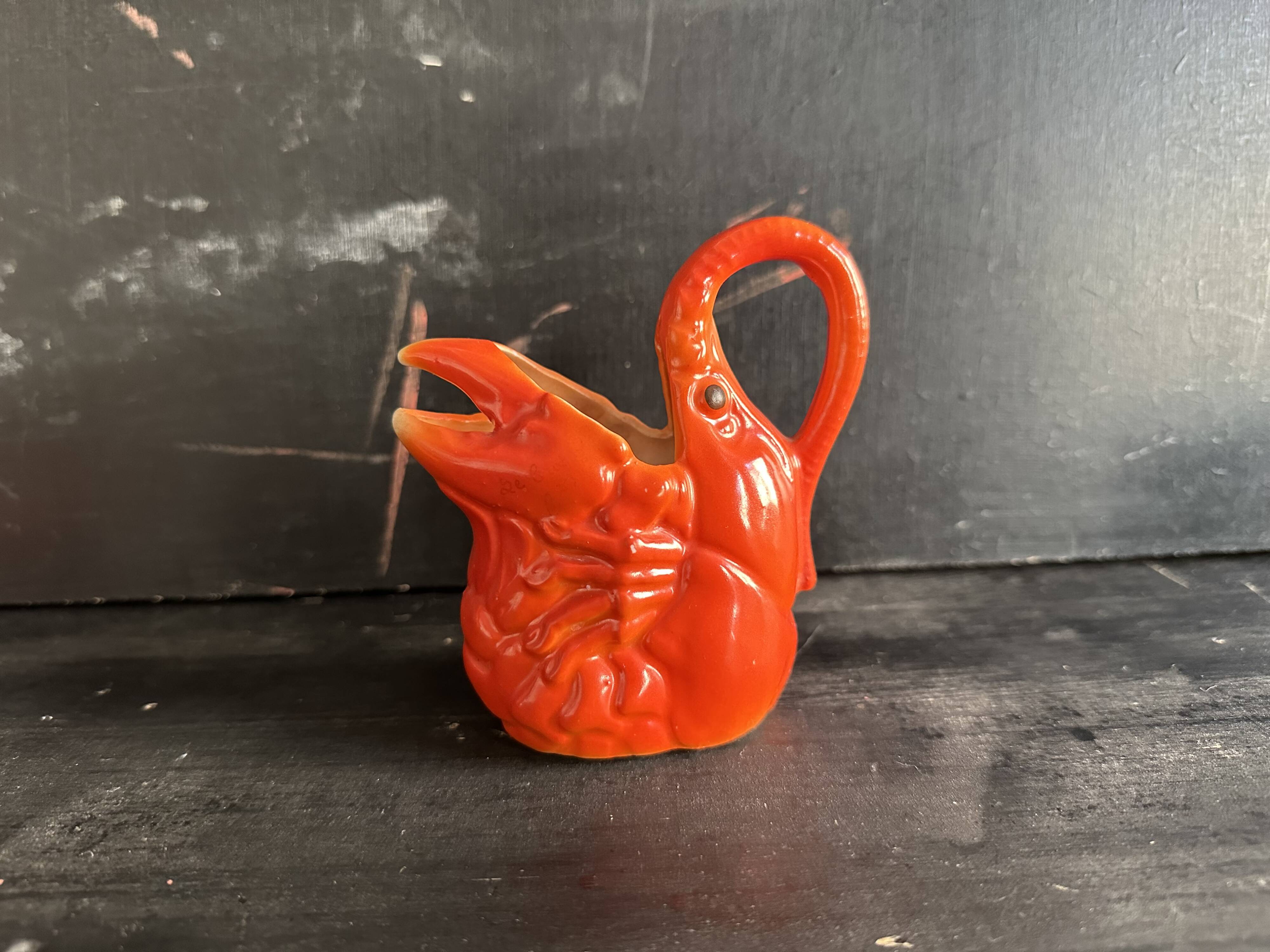 Antique ceramic lobster pitcher from the early 20th century.