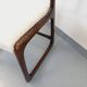 Vintage sled chair by Baumann in wood and boucle fabric.