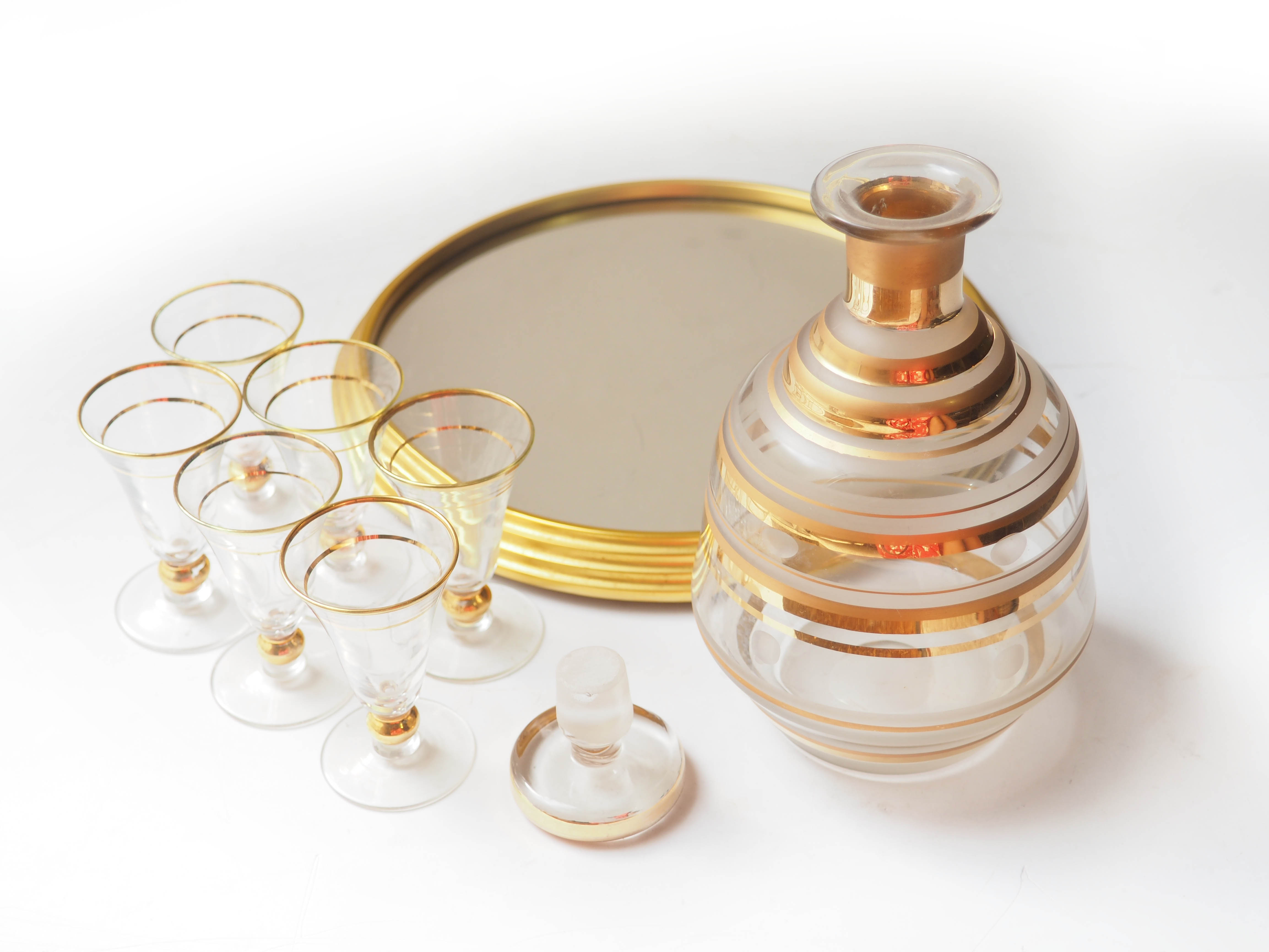 Service with cafare glasses and mirror tray