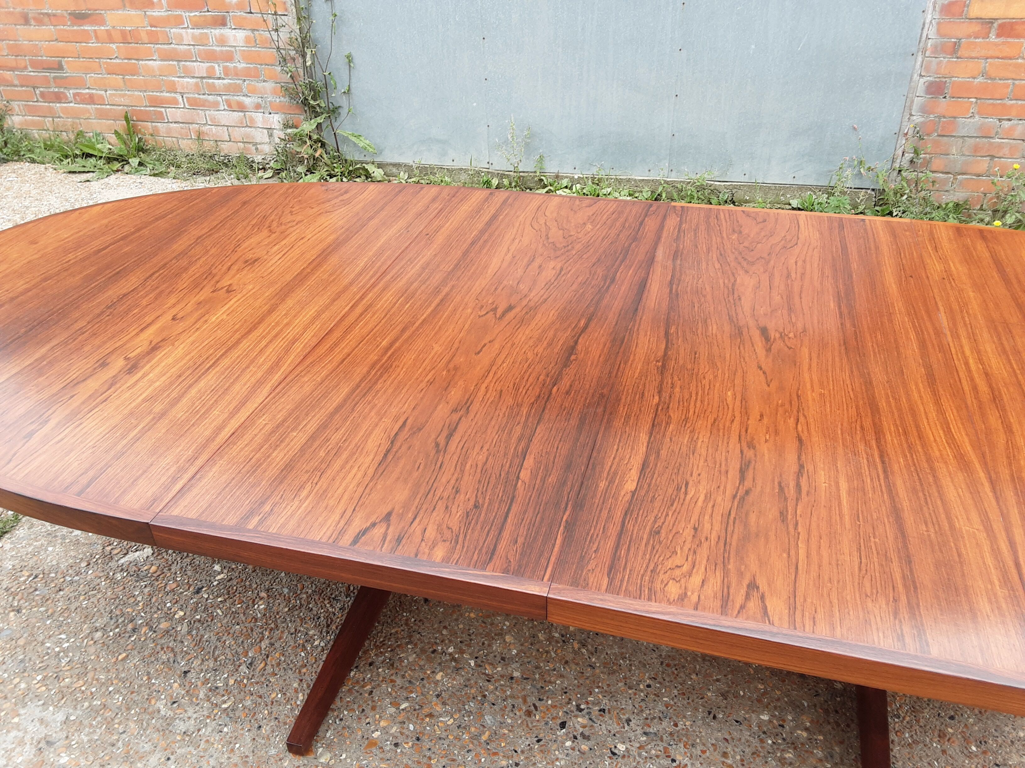 Mid century rosewood extendable dining table by John Mortensen