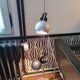 Two-light floor lamp with removable magnetic Eyes Ball.