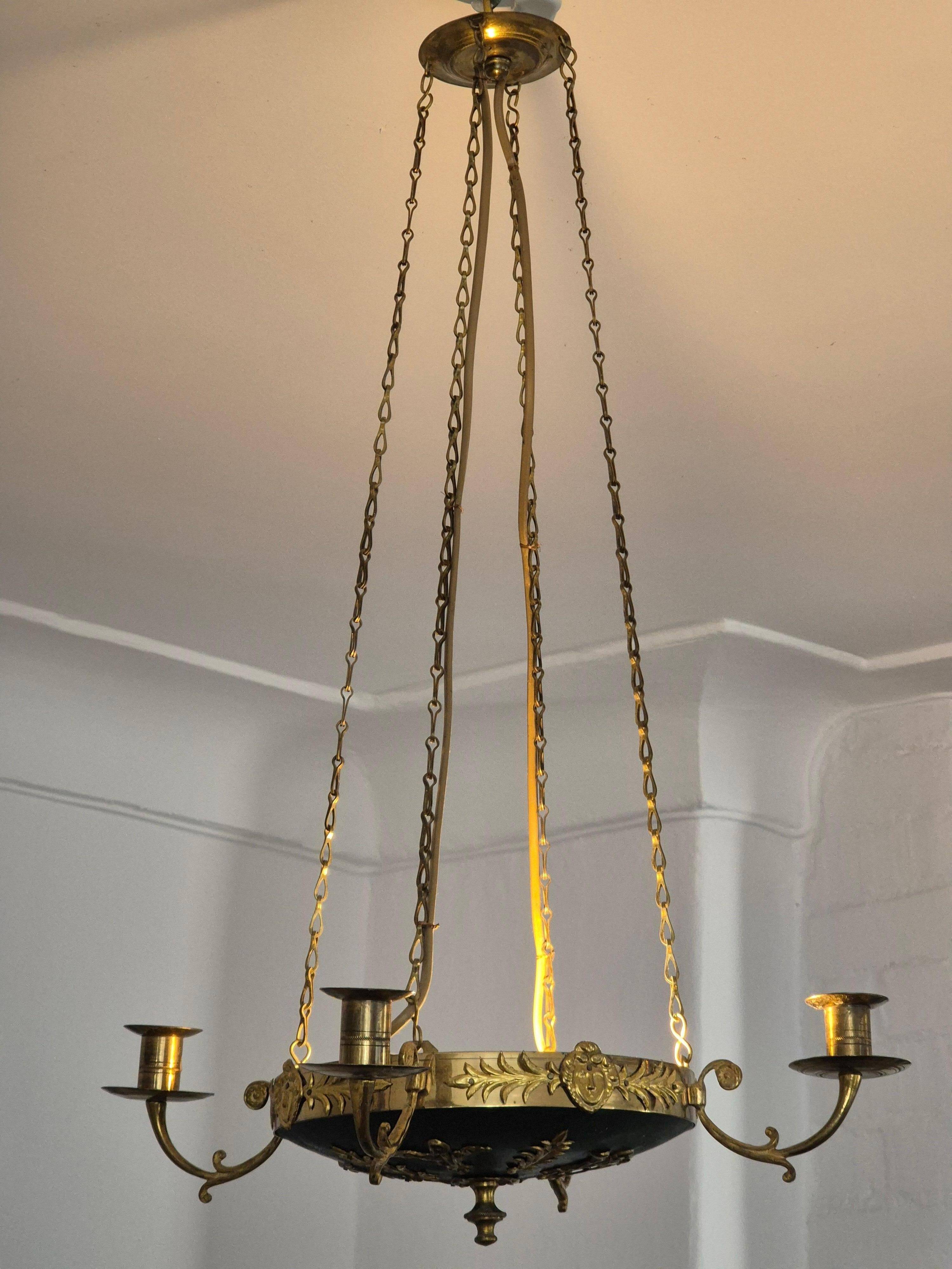 Pendant in brass with two light sockets and four candle holders, Empire style