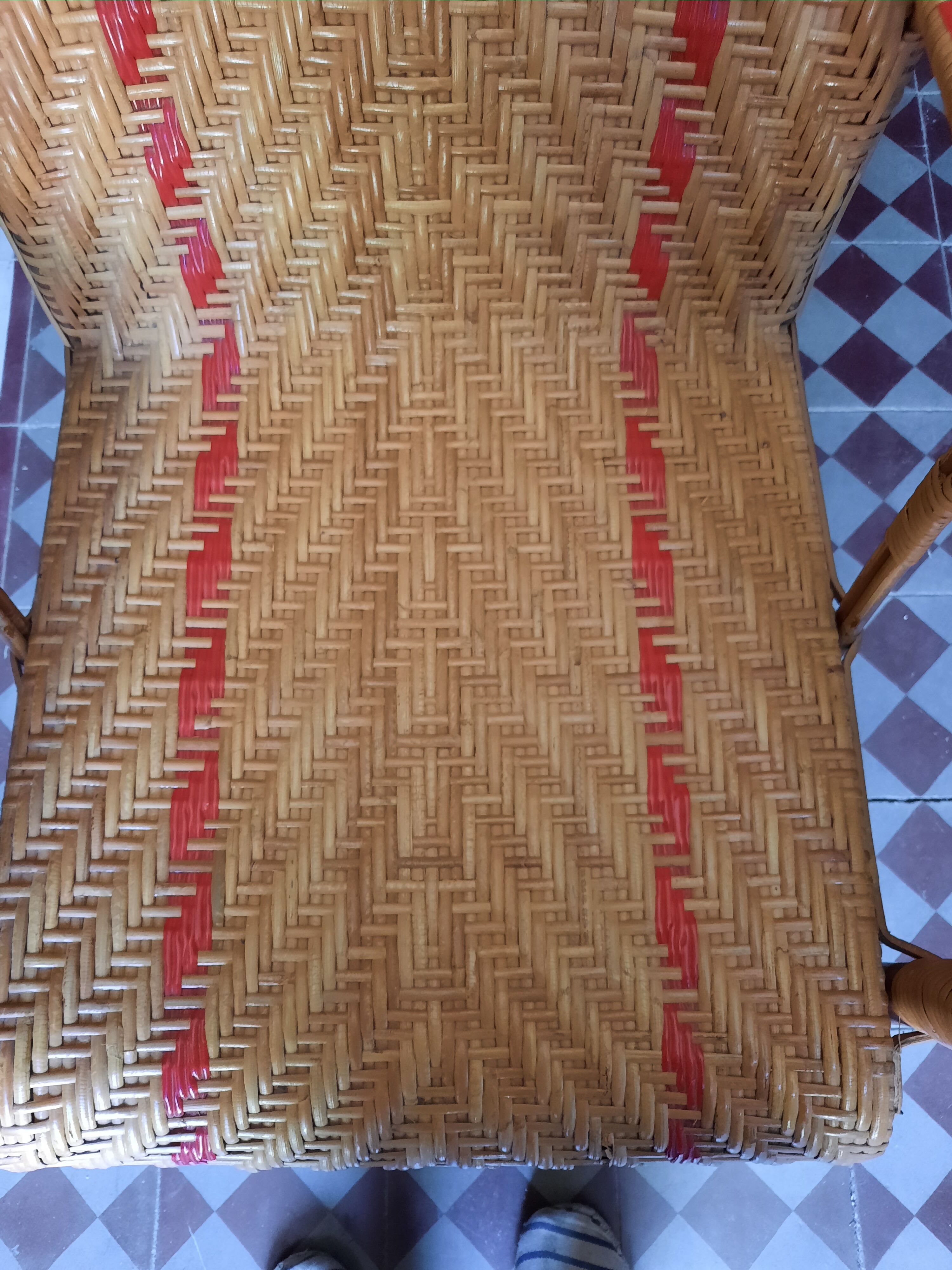 Braided rattan armchair