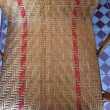 Braided rattan armchair