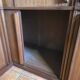 Modular corner library Oscar from the 1960s with sliding doors.