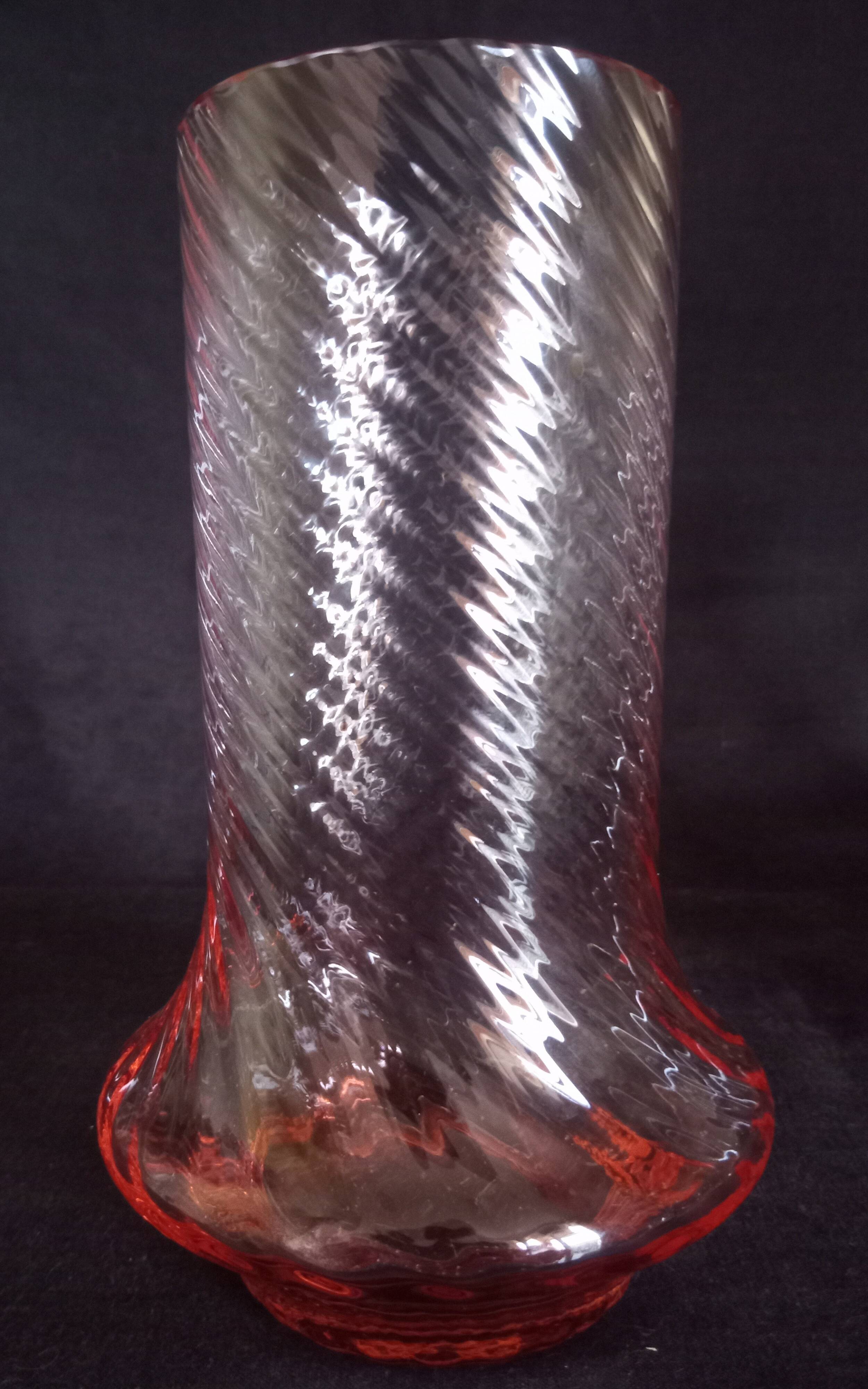 Art Deco orangeade service in pink-orange glass, twisted model.