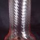 Art Deco orangeade service in pink-orange glass, twisted model.