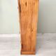 Small wooden piece of furniture, cabinet style, false drawers.