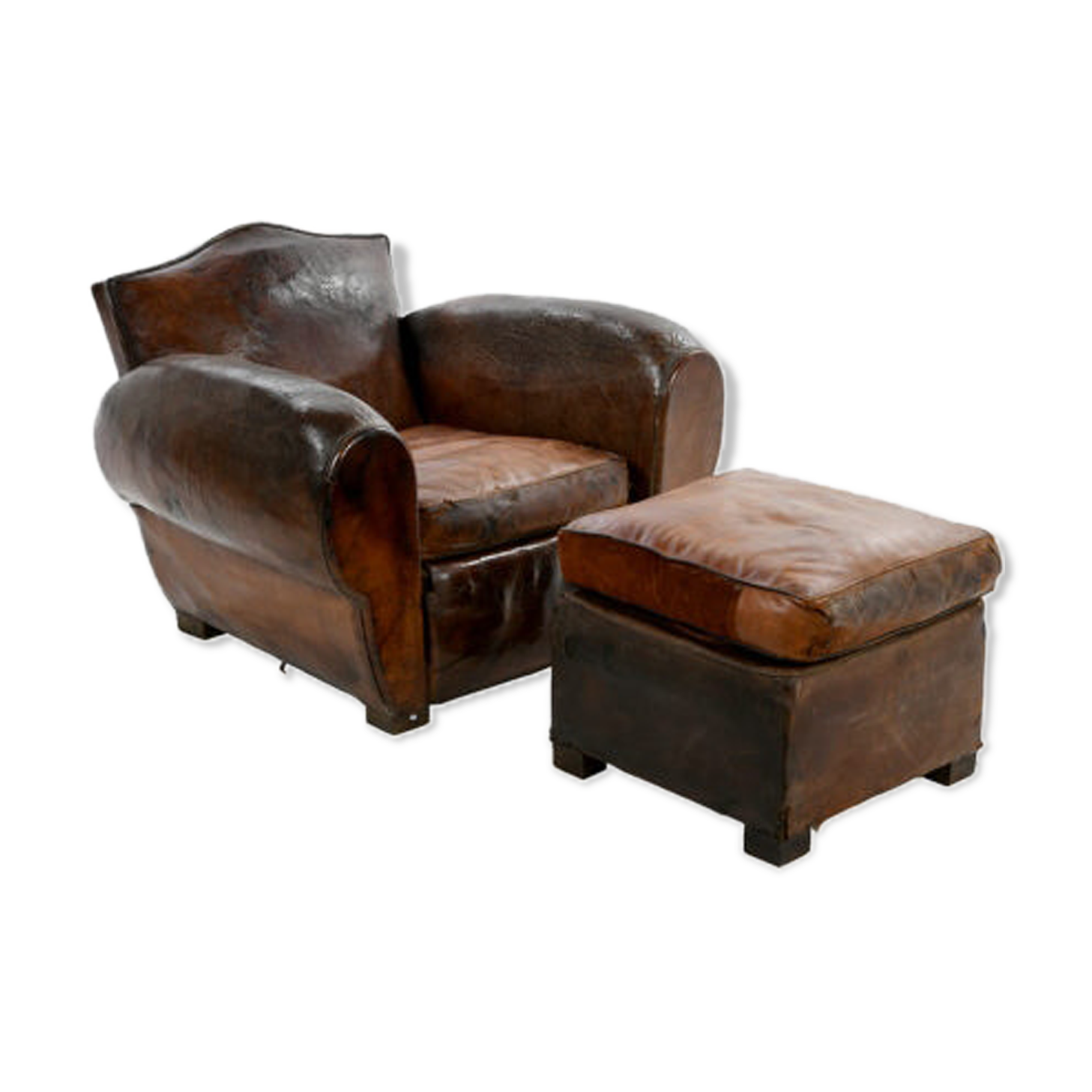 Club armchair and leather ottoman