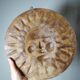 Anthropomorphic sun wall sculpture in patinated terracotta, vintage Italian craftsmanship.