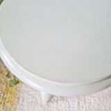 Antique tripod stool made of solid wood in blue.