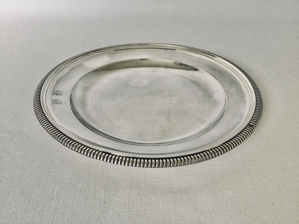 Solid silver dish with old man