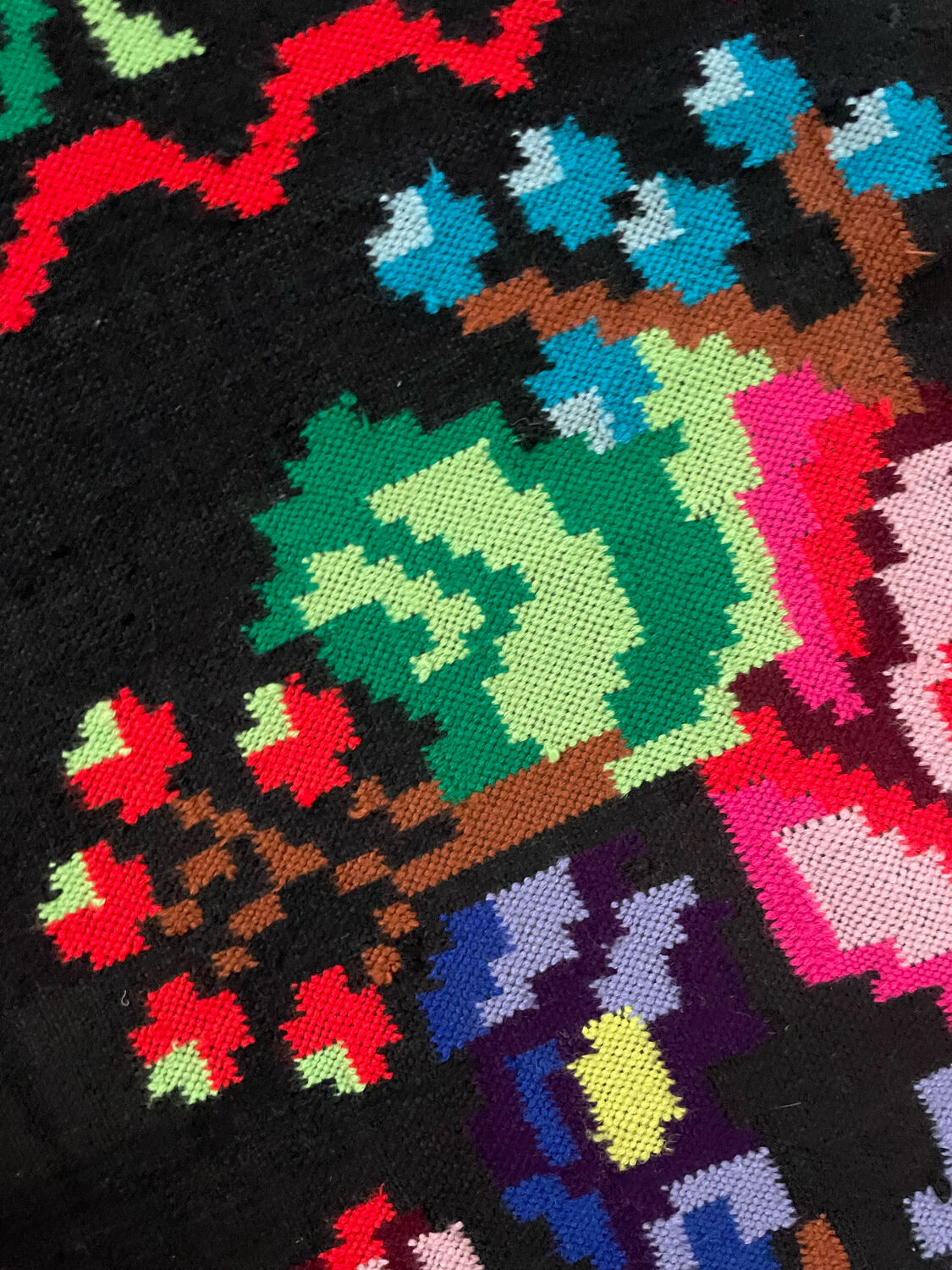 Vintage Romanian handwoven carpet with floral colorful design