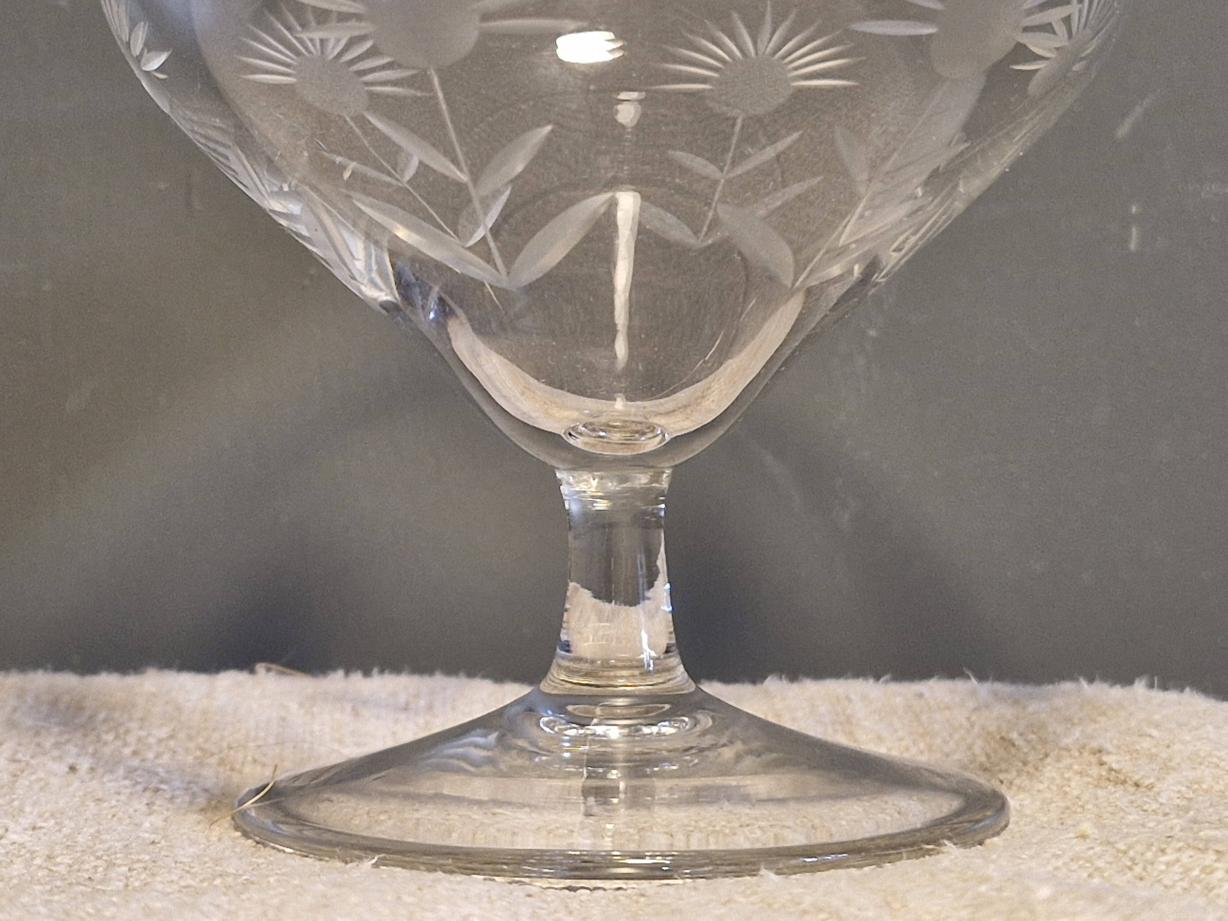 3 antique champagne coupes in engraved crystal with large daisies.