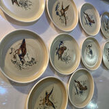 Many vintage flat plates from Sarreguemines.