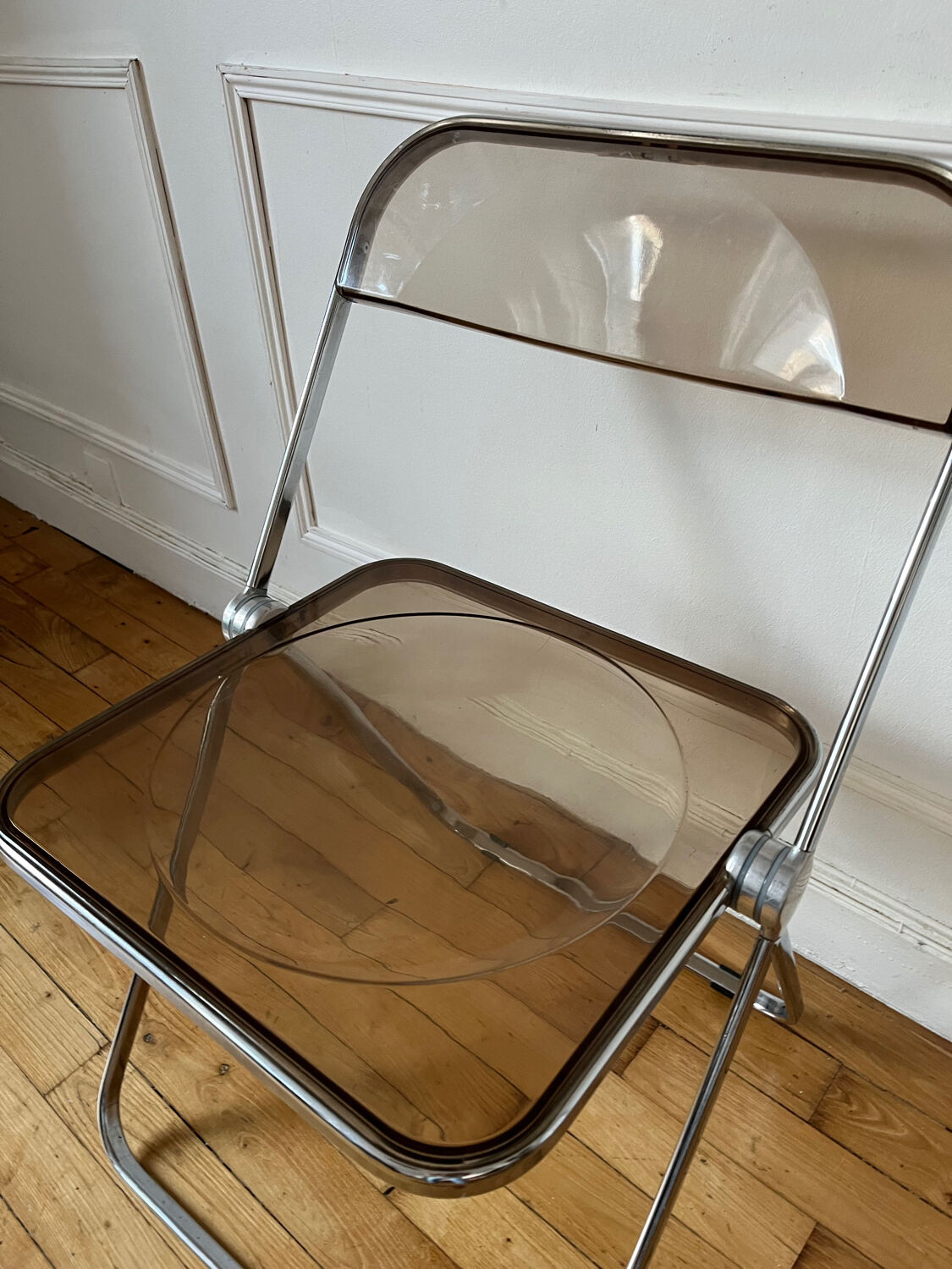 Plia folding chair by Giancarlo Piretti Castelli