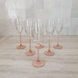 6 champagne flutes with pink stems