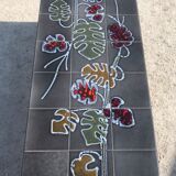 Enamelled ceramic table Philodendrons motifs, signed Adri