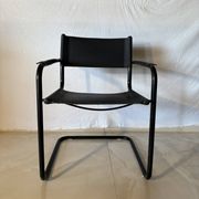 Set of 12 vintage black leather and tubular steel chairs – Italy, year