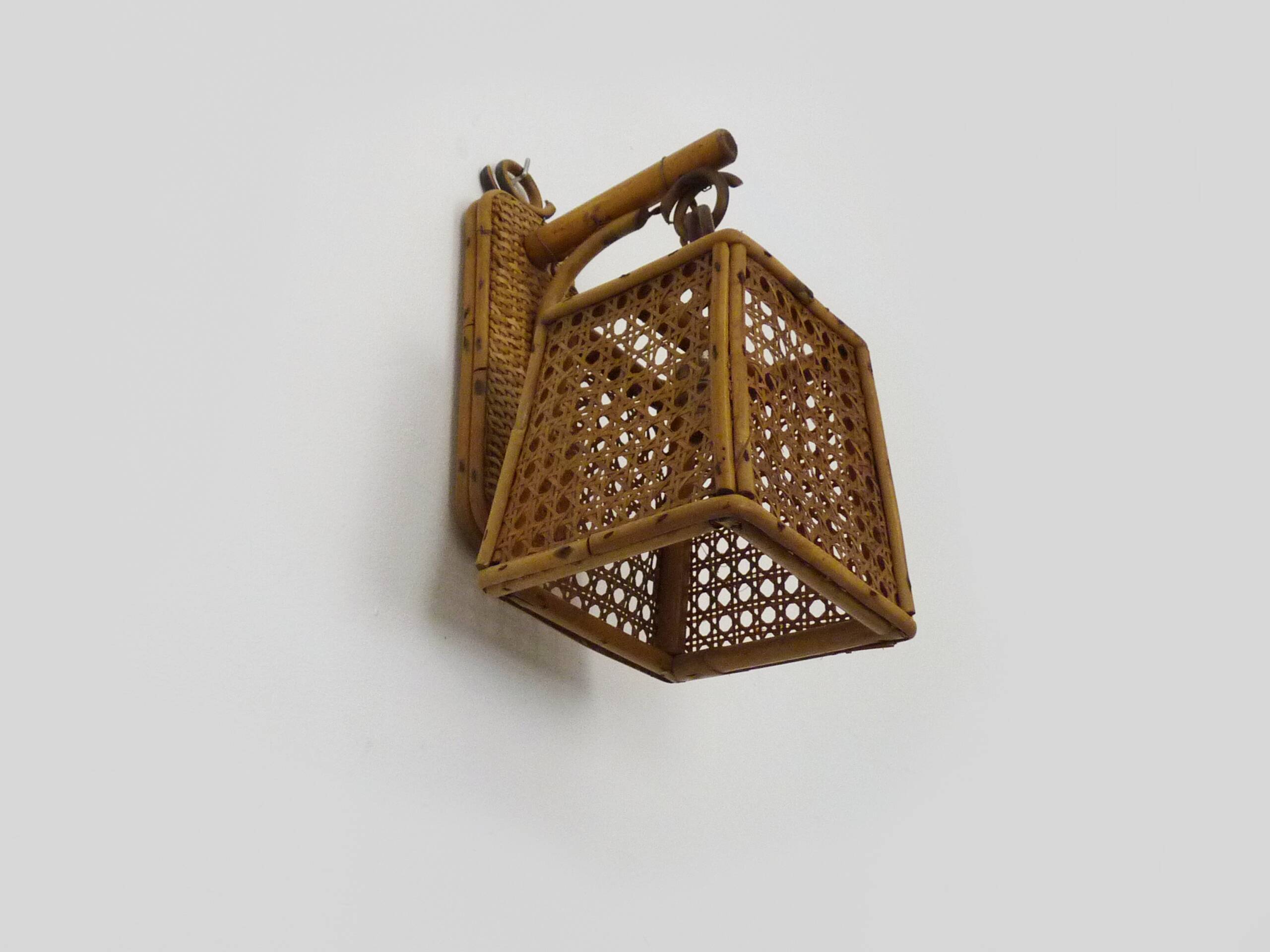 Rattan and cane lantern wall light. 1950s-1960s