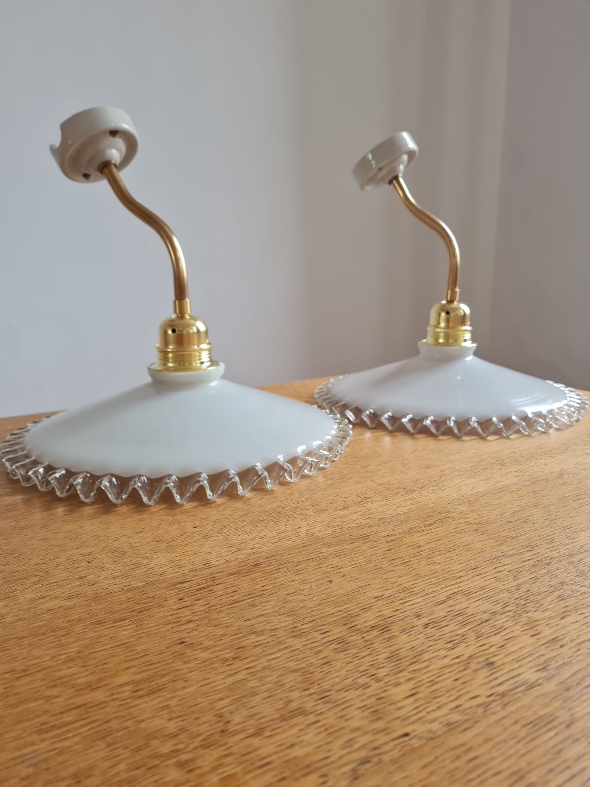 Pair of opaline wall lamps