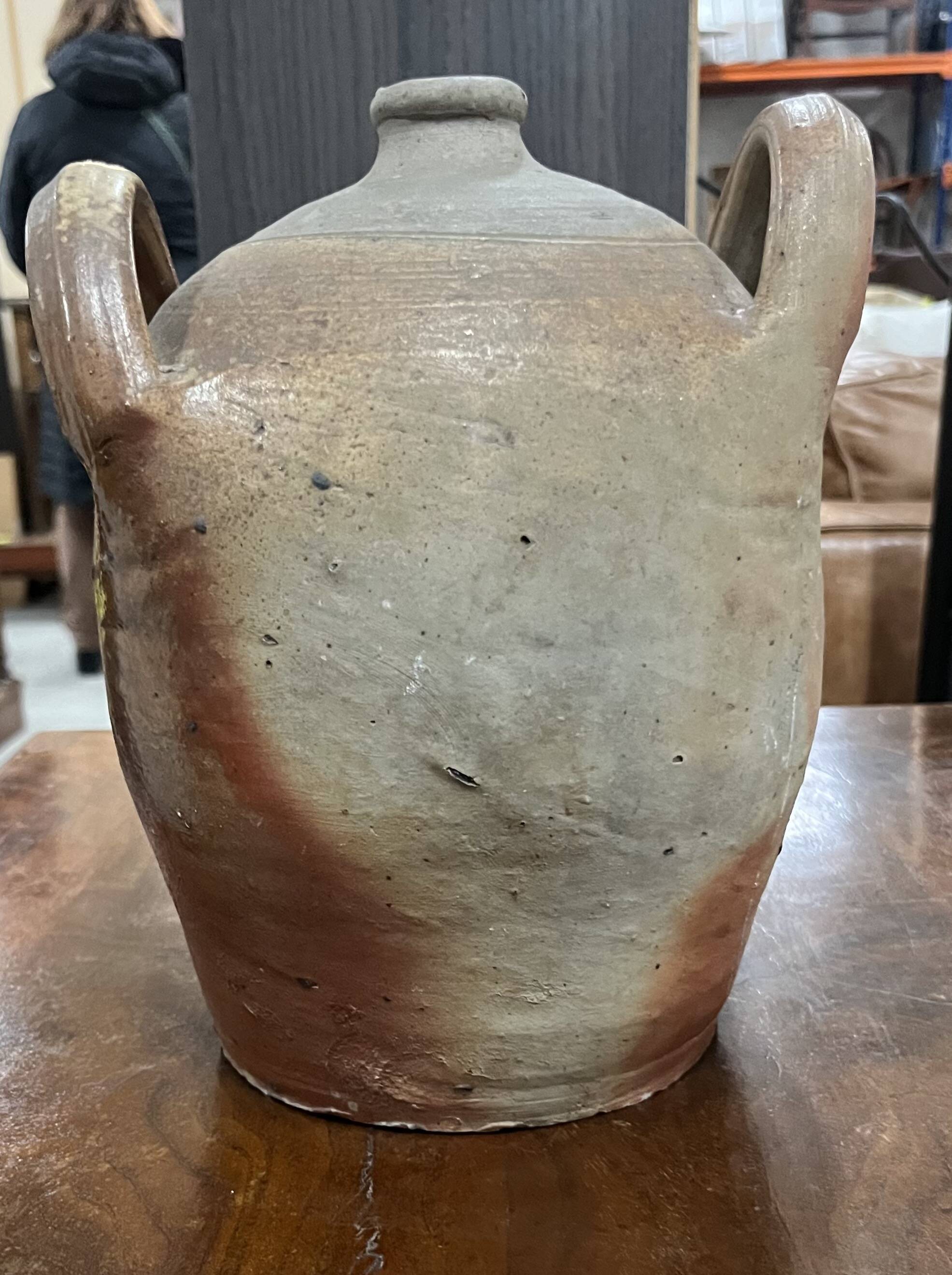 Old large terracotta vinegar pan