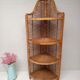 Tall rattan shelf