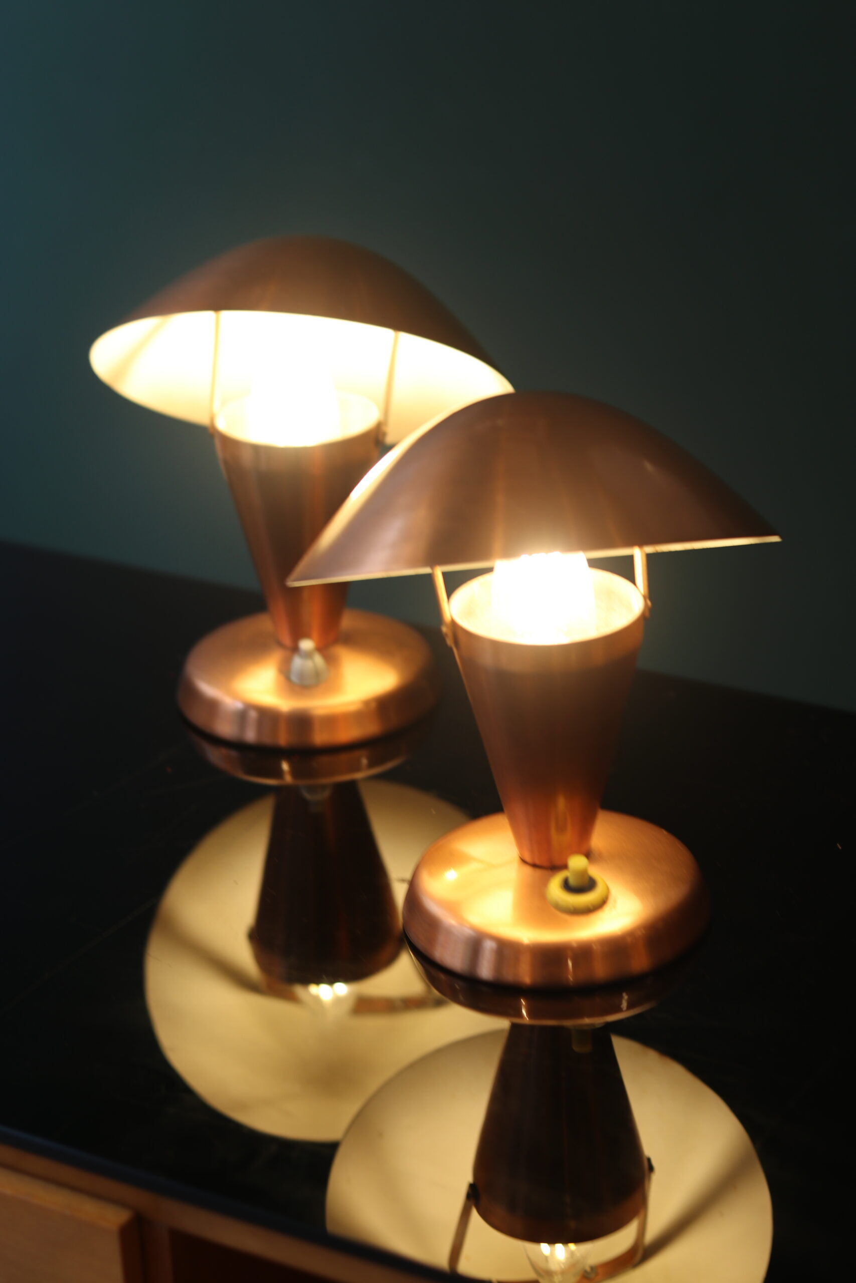 Pair of Bauhaus style mushroom lamps in copper metal.
