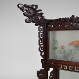Asian wooden lantern carved with dragons and painted glass panels