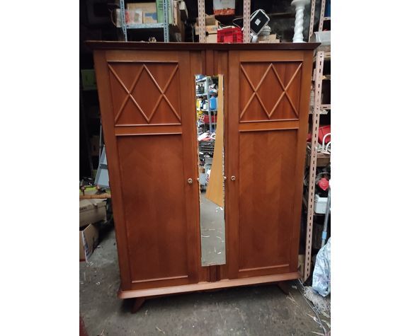 Vintage wardrobe with compass feet and central mirror Scandinavian style design